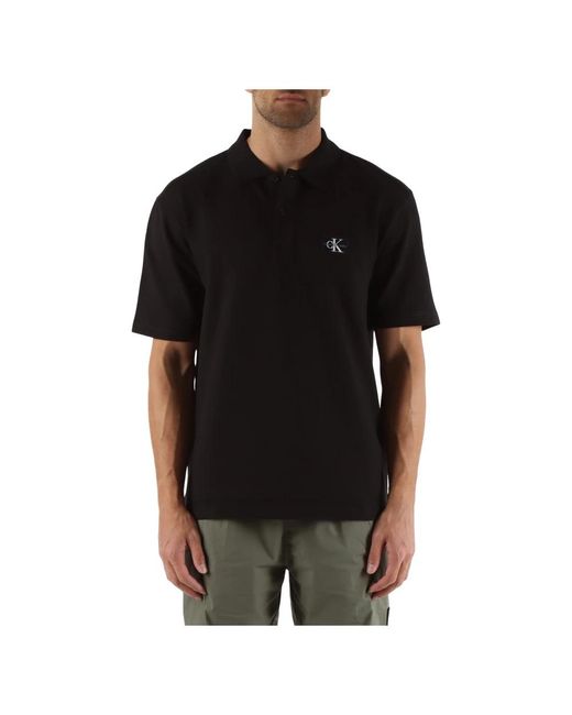 Polo in cotone stretch con patch logo di Calvin Klein in Black da Uomo