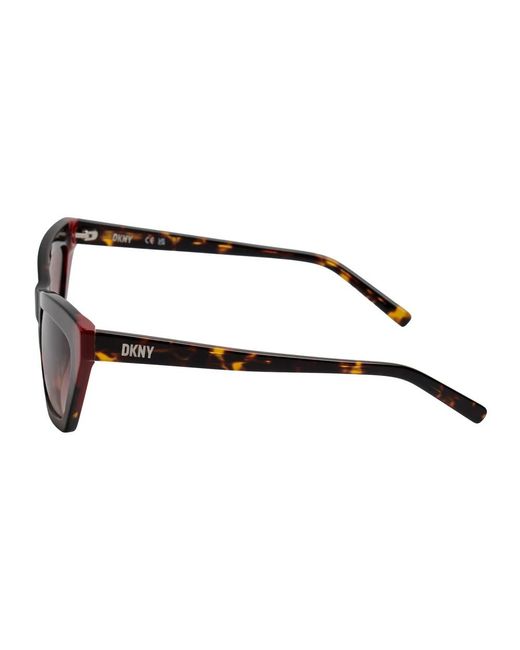 Sunglasses di DKNY in Brown
