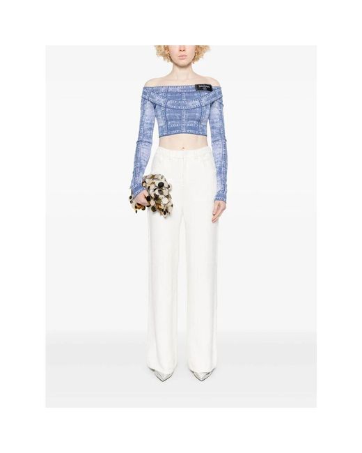 Top a maniche lunghe effetto denim con logo di Balmain in Blue