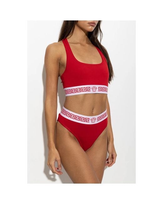 Bottoms Versace de color Red