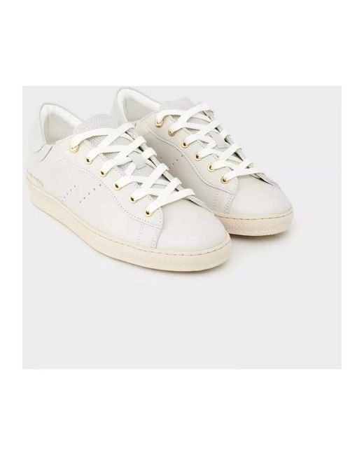 Sneakers eleganti bianchi perforati di Filling Pieces in White