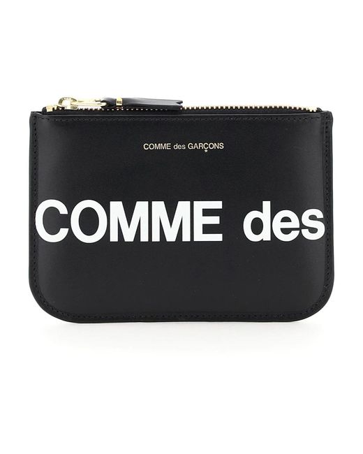 Pochette in pelle con stampa logo e chiusura lampo di Comme des Garçons in Black da Uomo