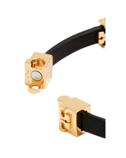 Bracelets Tory Burch de color Black