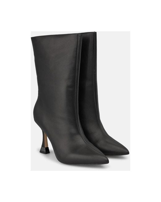 Alma En Pena. Black Heeled Boots