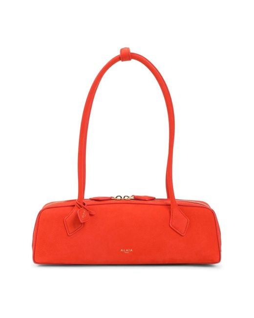 Alaïa Red Shoulder Bags