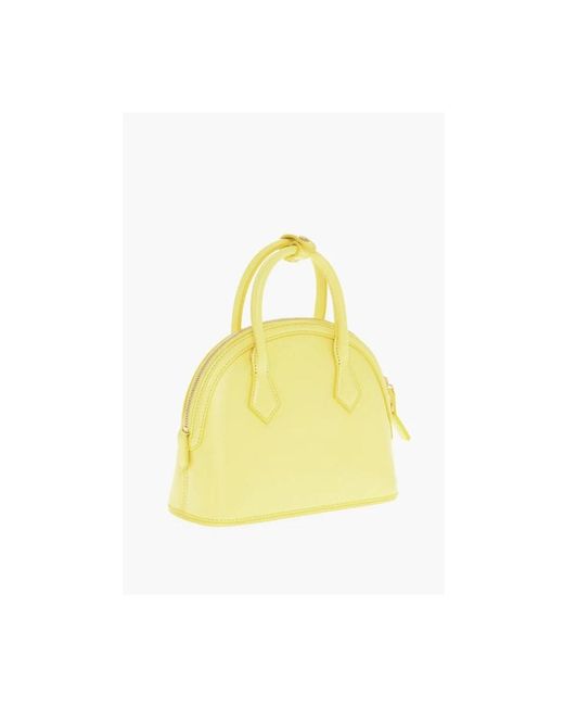 Handbags di MCM in Yellow