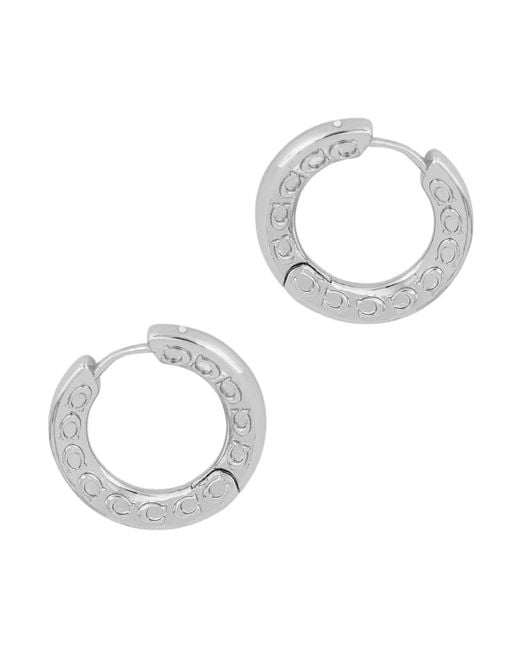 Earrings COACH de color Metallic