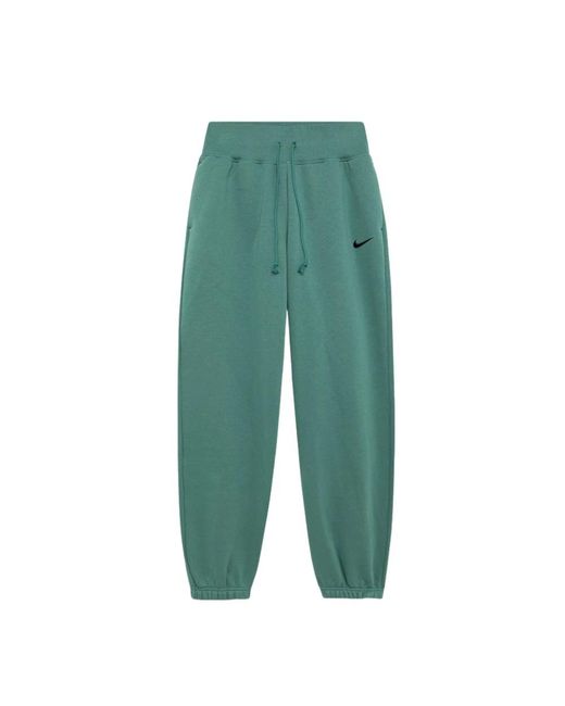 Pantaloni in felpa phoenix con logo ricamato di Nike in Green da Uomo