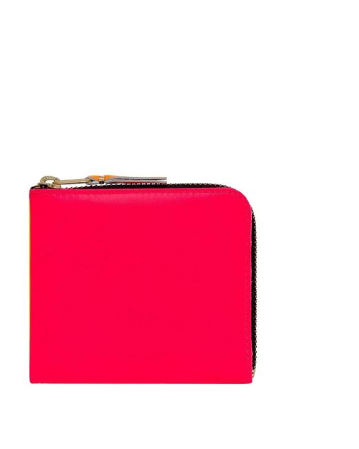 Wallets & Cardholders di Comme des Garçons in Pink