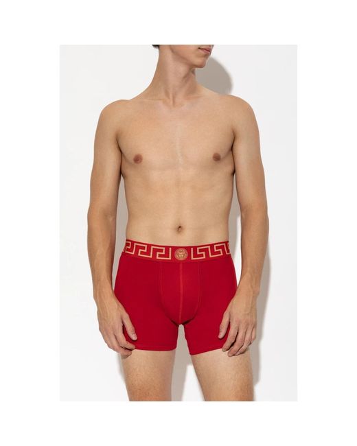 Bottoms Versace pour homme en coloris Red