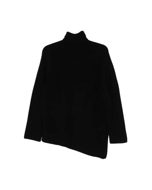 Christian Wijnants Black Turtlenecks