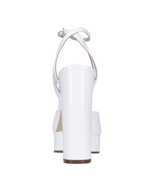 Casadei White Pumps