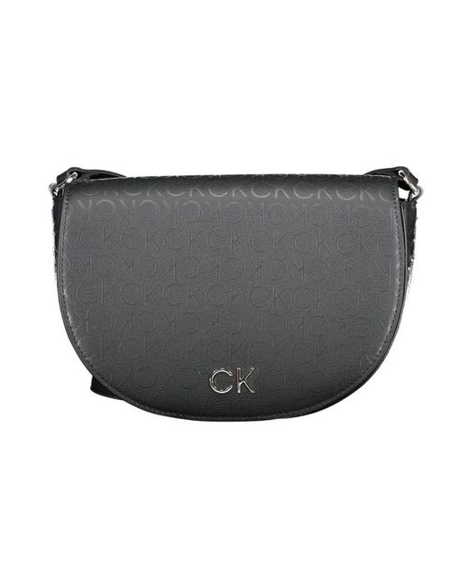 Calvin Klein Black Monogram style crossbody tasche