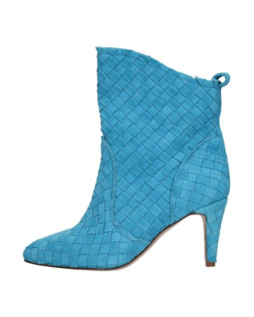 The Seller Blue Heeled Boots