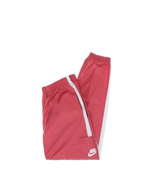 Nike Fitness ,Roze ,Polyester Essentiële Geweven Jogger Trainingsbroek Roze/Wit in het Red