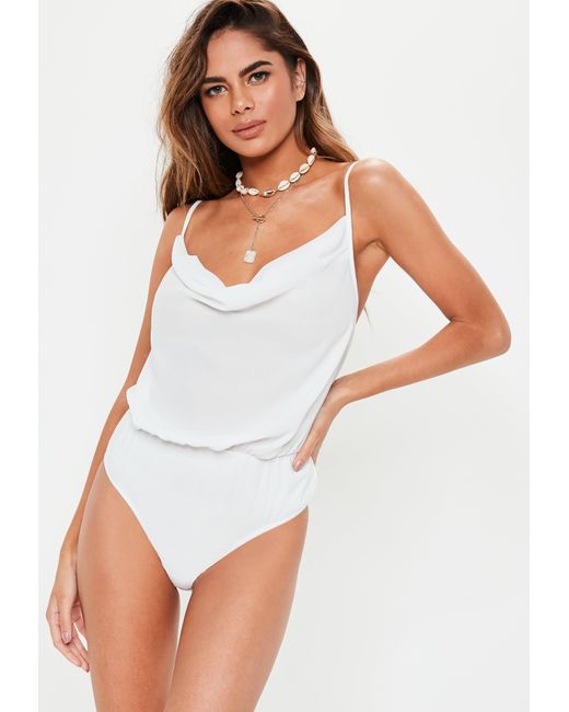 white strappy bodysuit