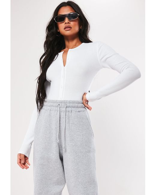 white button bodysuit