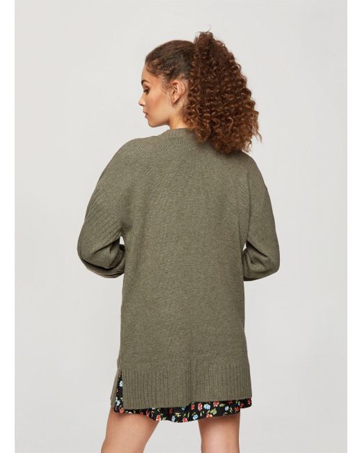 poncho sweater with fur trim