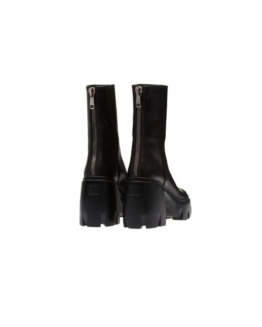 Miu Miu Black Oversized Sole Leather Ankle Boots