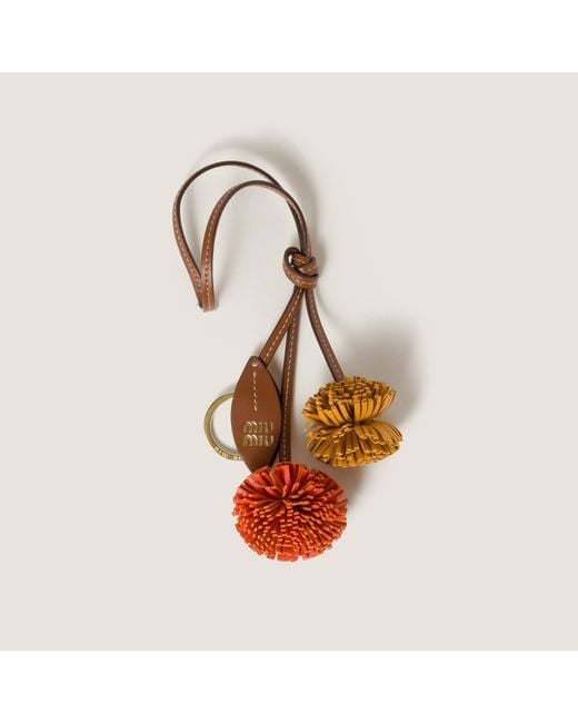 Miu Miu Leather Trick in Natural | Lyst