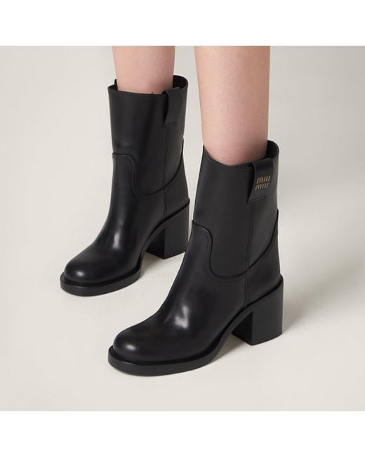 Miu Miu Black Logo Leather Ankle Boots