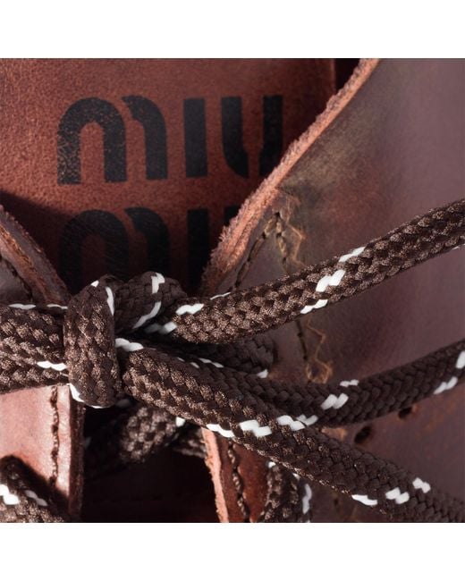 Miu Miu Brown Plume Leather Sneakers