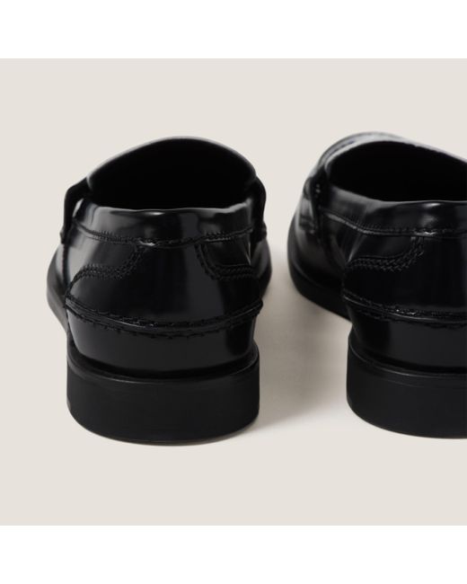 Miu Miu Black Leather Penny Loafers
