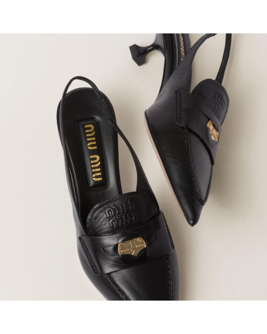 Miu Miu Black Leather Penny Loafers With Heel