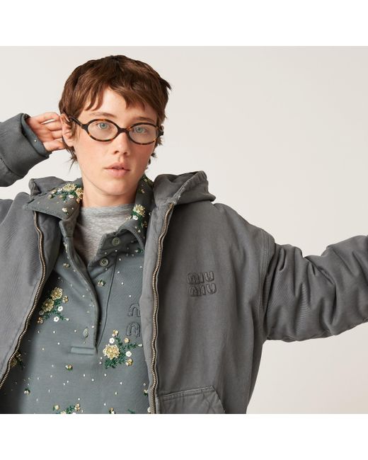 Miu Miu Garment-Dyed Blouson Jacket With Embroidered Logo in Miu Miu Garment-Dyed Blouson Jacket With Embroidered Logo in