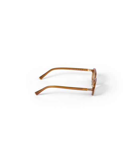 Miu Miu Metallic Miu Regard Sunglasses
