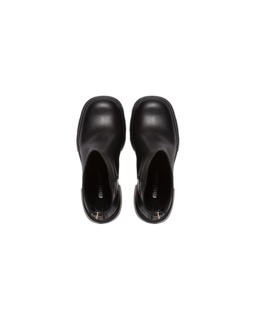 Miu Miu Black Oversized Sole Leather Ankle Boots