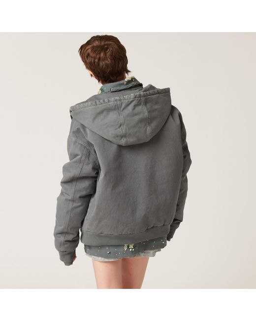 Miu Miu Garment-Dyed Blouson Jacket With Embroidered Logo in Miu Miu Garment-Dyed Blouson Jacket With Embroidered Logo in