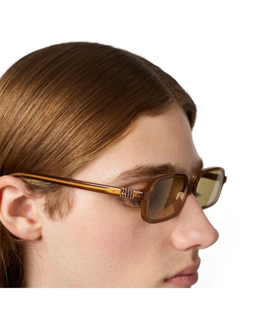 Miu Miu Metallic Miu Regard Sunglasses
