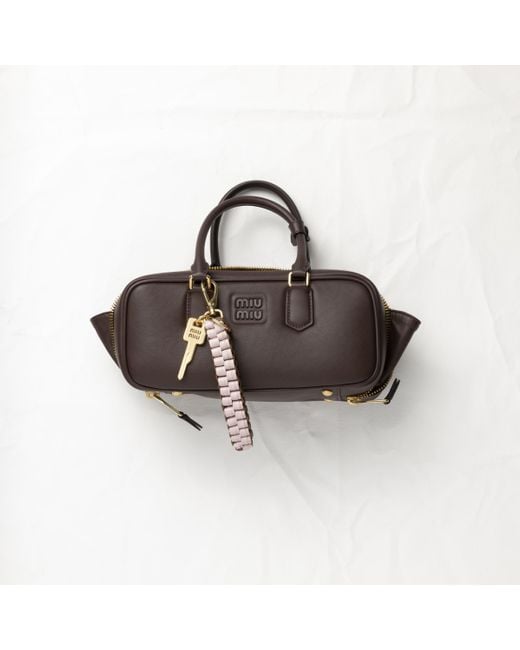 Miu Miu Leather Trick in Natural | Lyst