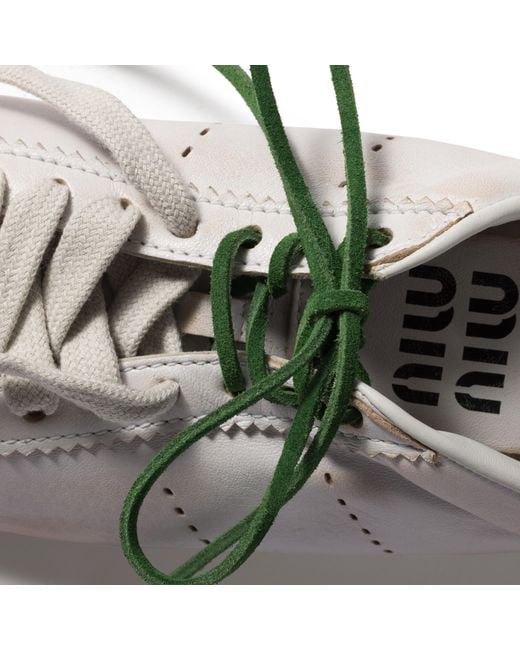Stringhe di Miu Miu in Green