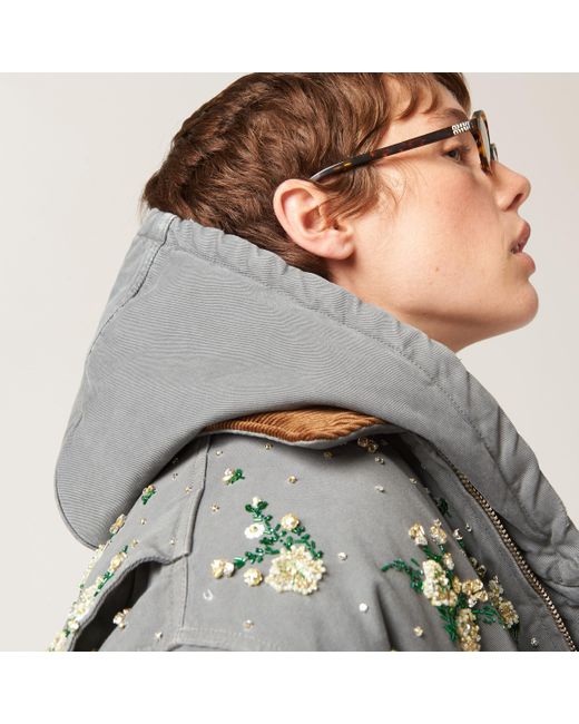 Garment-dyed blouson jacket with embroidered logo ブルゾン Miu Miu Garment-Dyed Blouson Jacket With Embroidered Logo in