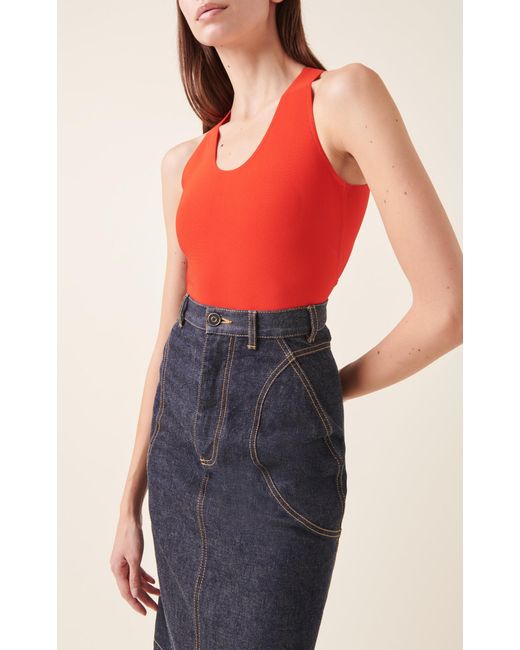 ALAÏA Off the Shoulder Bodysuit in Rose