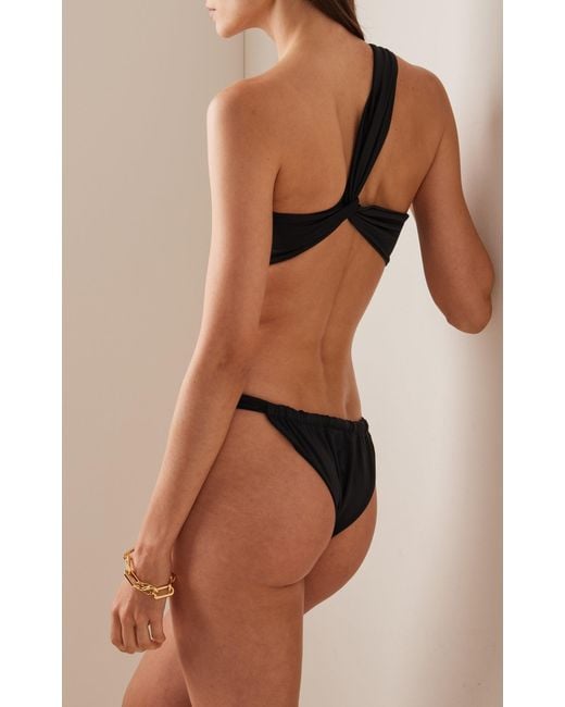 AEXAE Ruched One-shoulder Bikini Top in Black