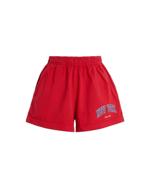 Sporty & Rich Red New York Ivy Cotton Disco Shorts