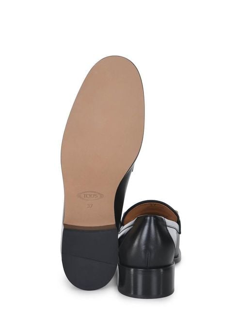 Tod's Black Flat Shoes