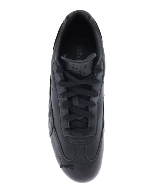 PUMA Black 'Speedcat' Low Top Sneakers With Embossed Logo On The Tongue And Contrasting Sole