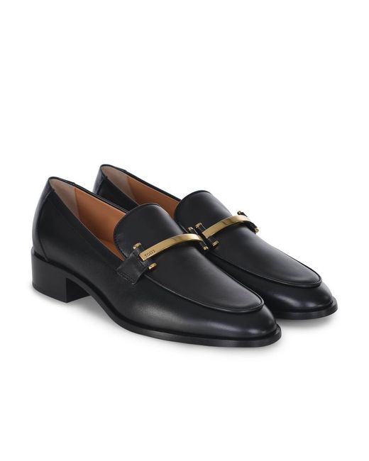 Tod's Black Flat Shoes