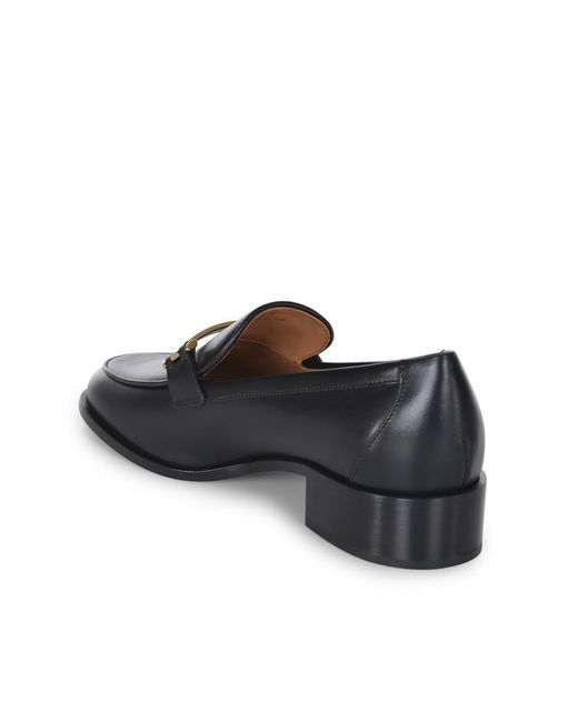 Tod's Black Flat Shoes