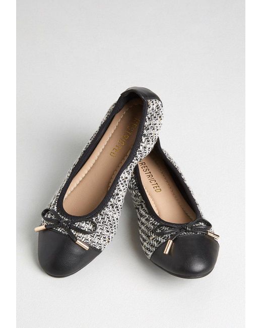 restricted black flats