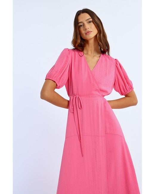Robe longue, manches ballons Molly Bracken en coloris Pink