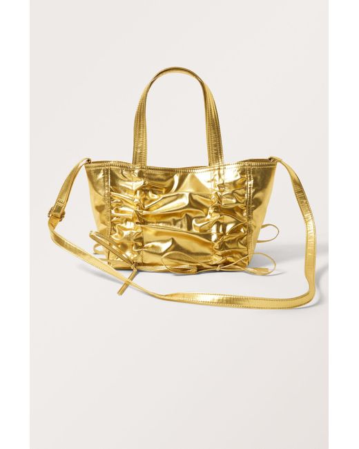 Monki Metallic Golden Bow Bag