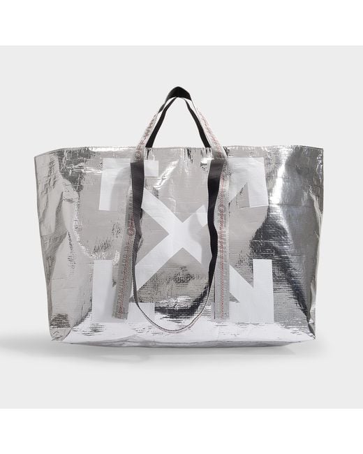 Off-White c/o Virgil Abloh Metallic Arrows Tote Bag In Silver And White Pvc