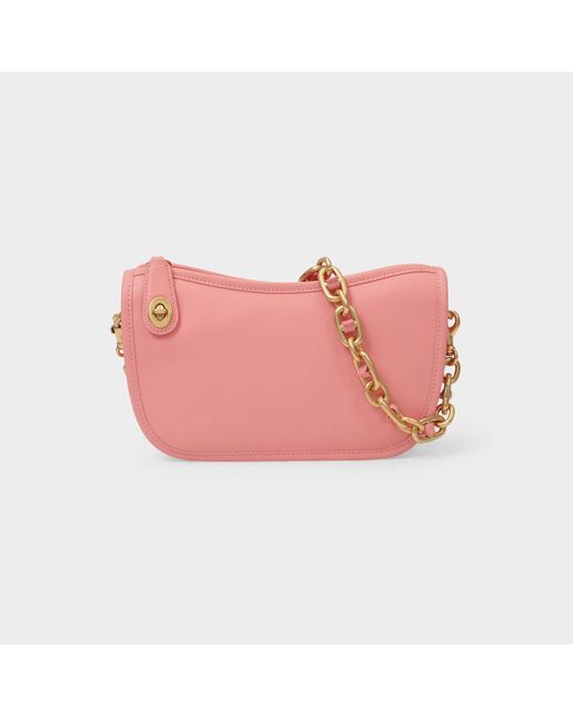 pink leather coach