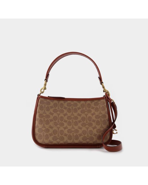 COACH Coated Canvas Signature Cary Crossbody in Brown Lyst Canada
