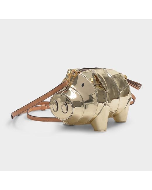 Tory burch pig cheap